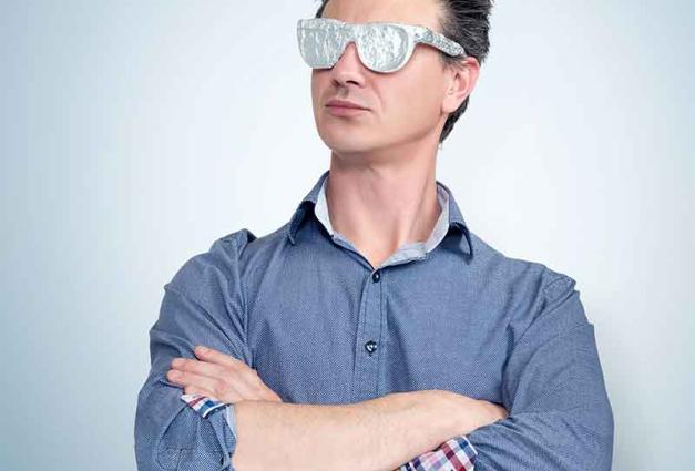 Man wearing tin foil covered sunglasses