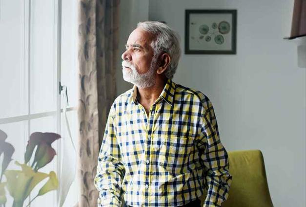 Elderly Indian man in self-isolation at home