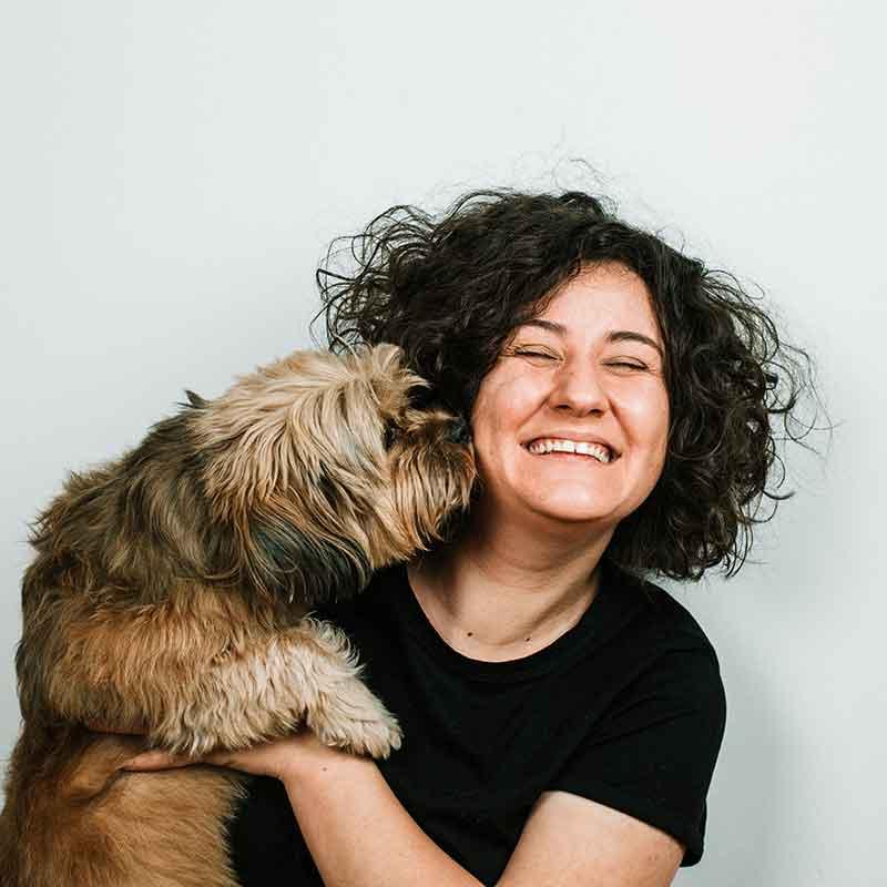 Woman holding dog