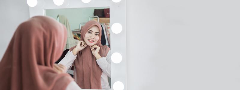 woman wearing hijab in the mirror