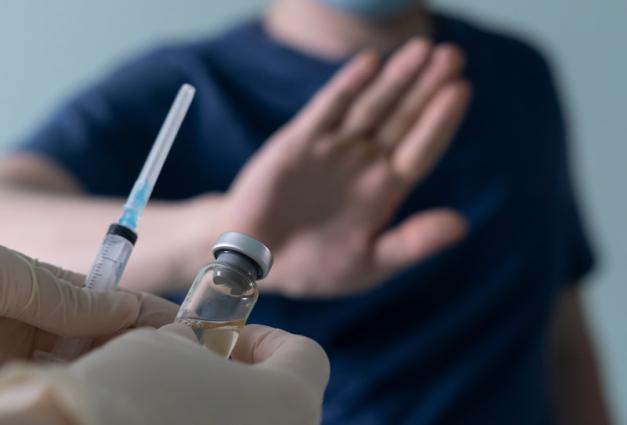 Man rejecting vaccine