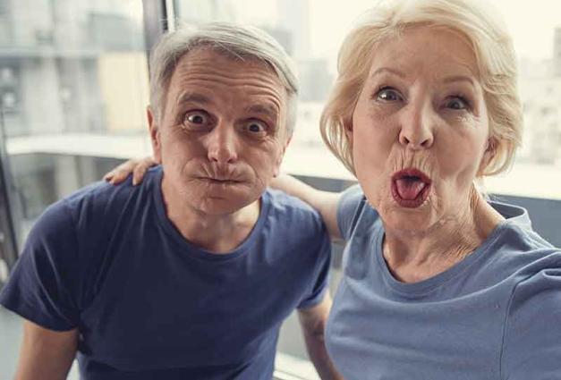 older couple making faces