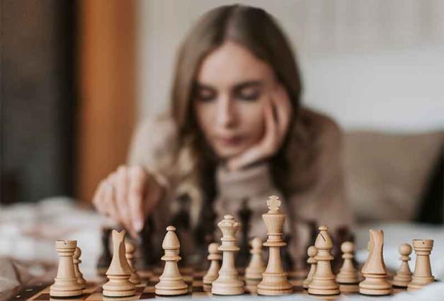 Woman playing Chess