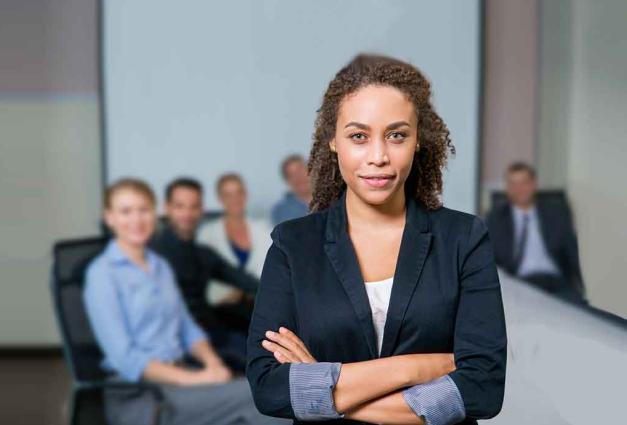Woman standing in front of meeting