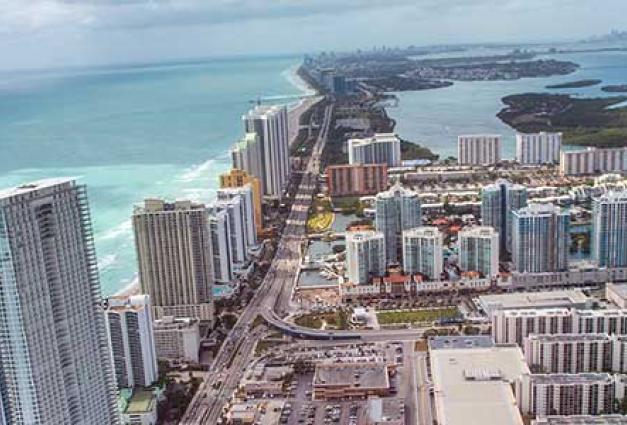 Helicopter view of North Miami Beach condominiums along the ocean