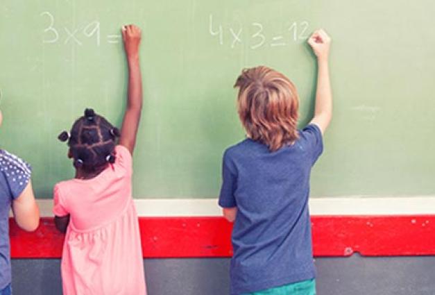 Children at chalkboard