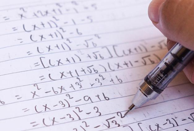 image of student doing math