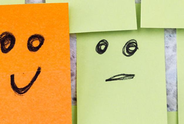 Image of post-it notes with different facial expressions