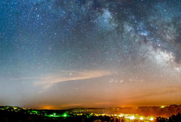 Image of the Milky Way Galaxy over a beautiful landscape