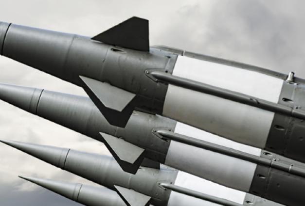 Image of missiles lined up aimed towards the sky