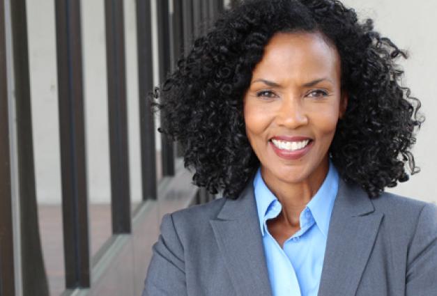 Image of a confident African American woman in business attire