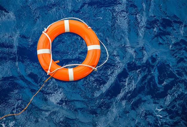 Image of life preserver floating on water