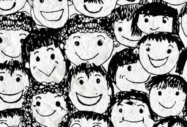 Illustration of children's faces drawn in a child's art style